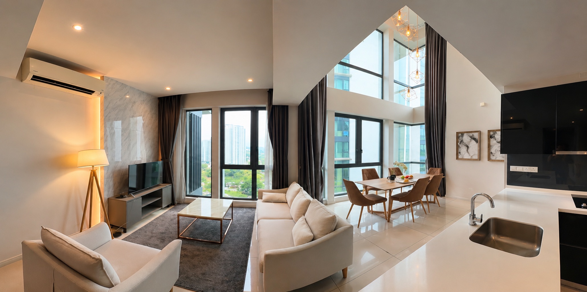 Actual student residence show unit with living, dining and kitchen areas
